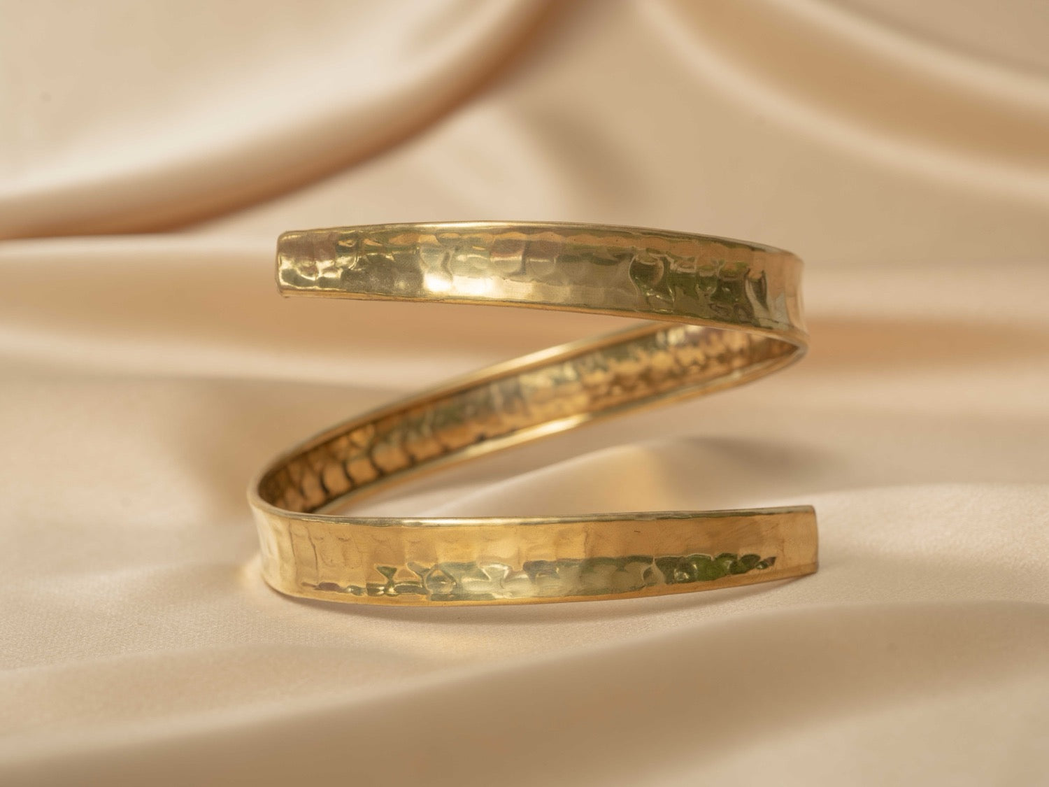 Siren Spiral Cuff handmade brass arm cuff in gold — Land of Sundara