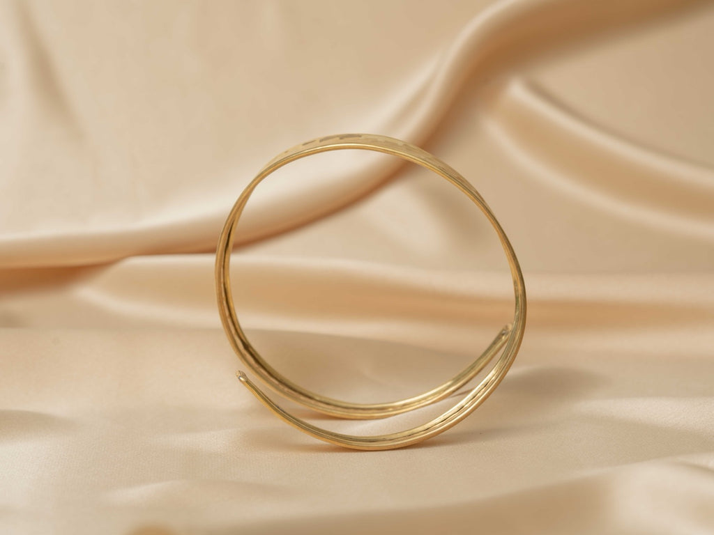 Siren Spiral Cuff handmade brass arm cuff in gold — Land of Sundara