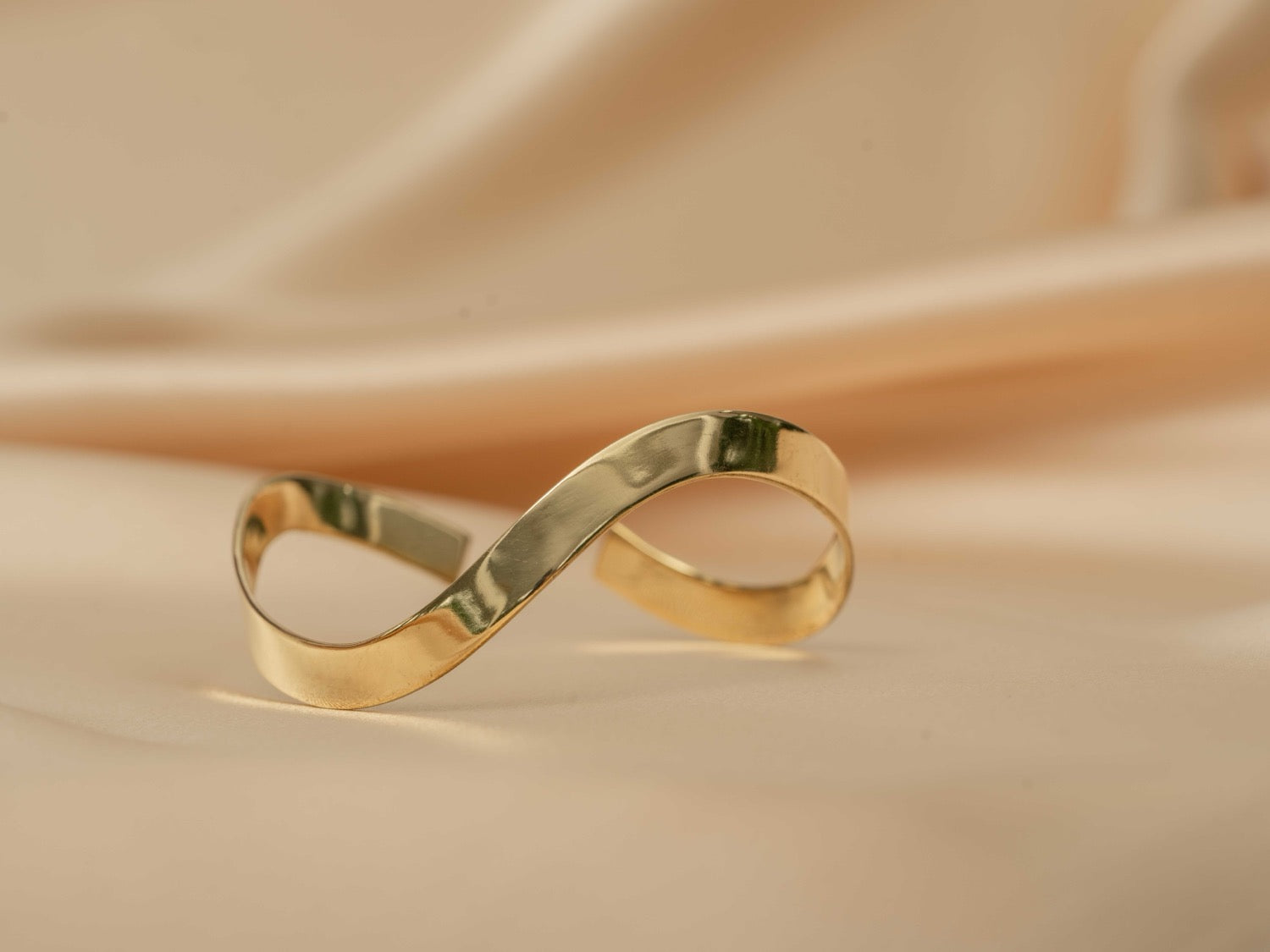 Infinity gold bangle handmade brass bracelet in gold — Land of Sundara