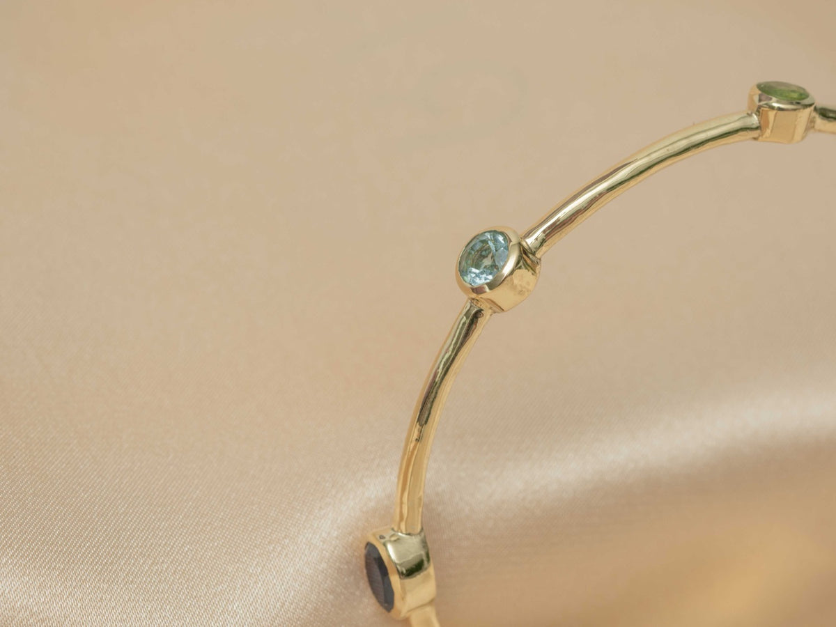Aurelia Gem Bangle handmade brass bracelet with blue topaz / peridot / amethyst / iolite / carnelian / garnet