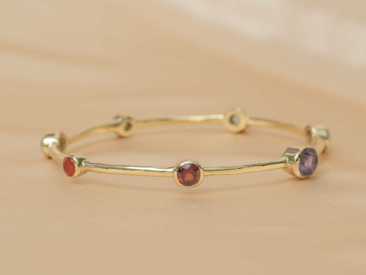 Aurelia Gem Bangle handmade brass bracelet with blue topaz / peridot / amethyst / iolite / carnelian / garnet