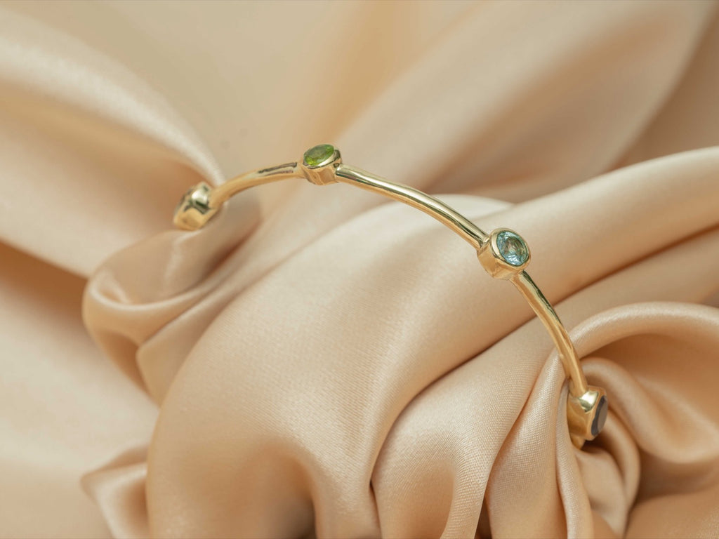 Aurelia Gem Bangle handmade brass bracelet with blue topaz / peridot / amethyst / iolite / carnelian / garnet