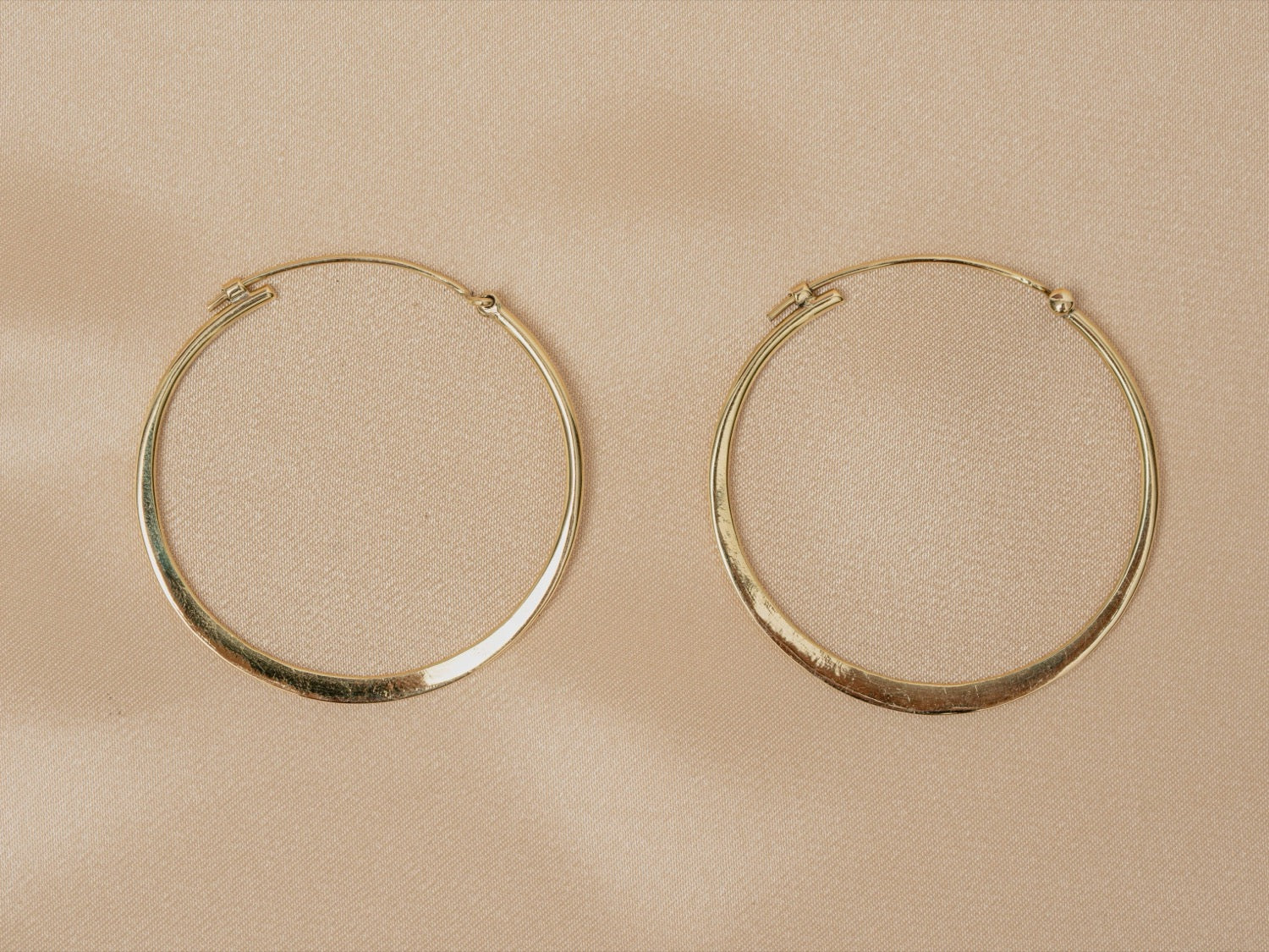 Horizon Hoop handmade brass earring in gold — Land of Sundara