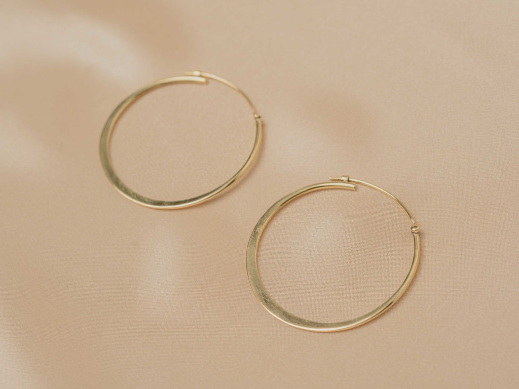 Horizon Hoop handmade brass earring in gold — Land of Sundara