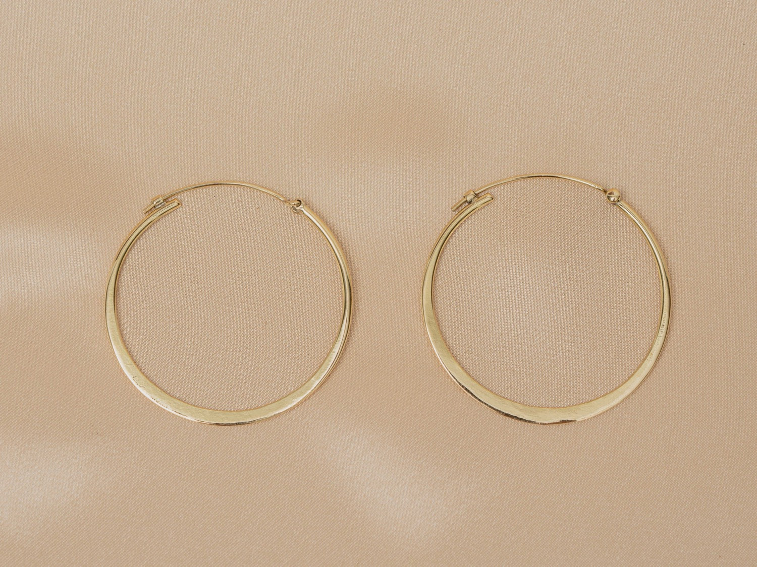 Horizon Hoop handmade brass earring in gold — Land of Sundara