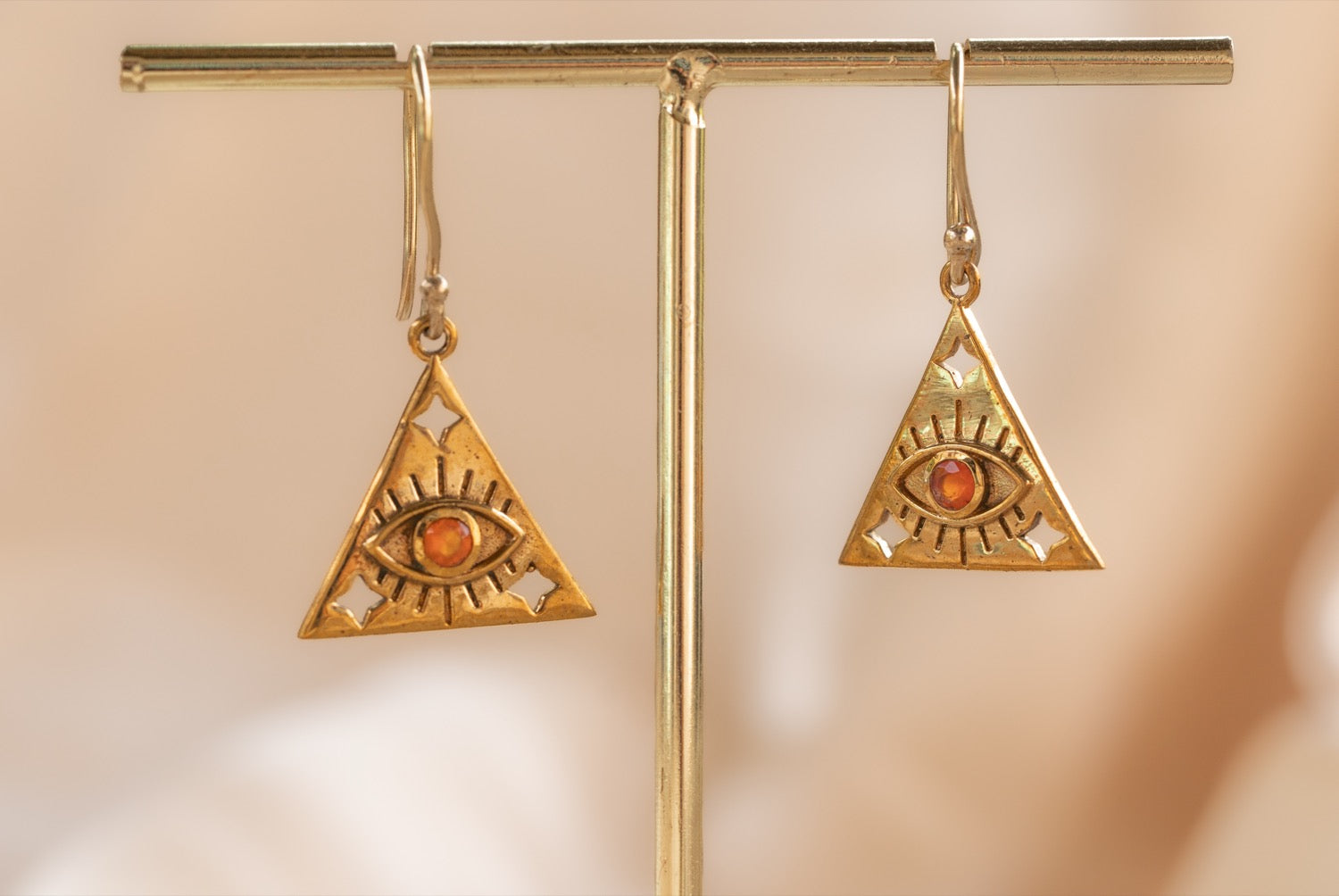 Eye of Horus Triangle handmade brass earring with carnelian stone — Land of Sundara