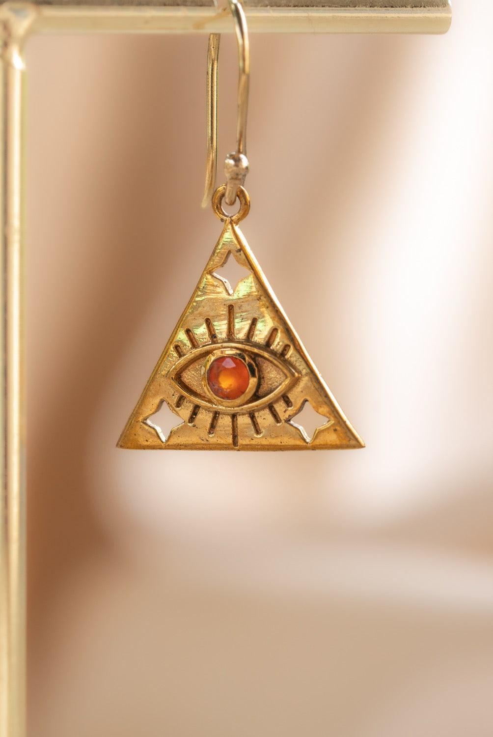 Eye of Horus Triangle handmade brass earring with carnelian stone — Land of Sundara