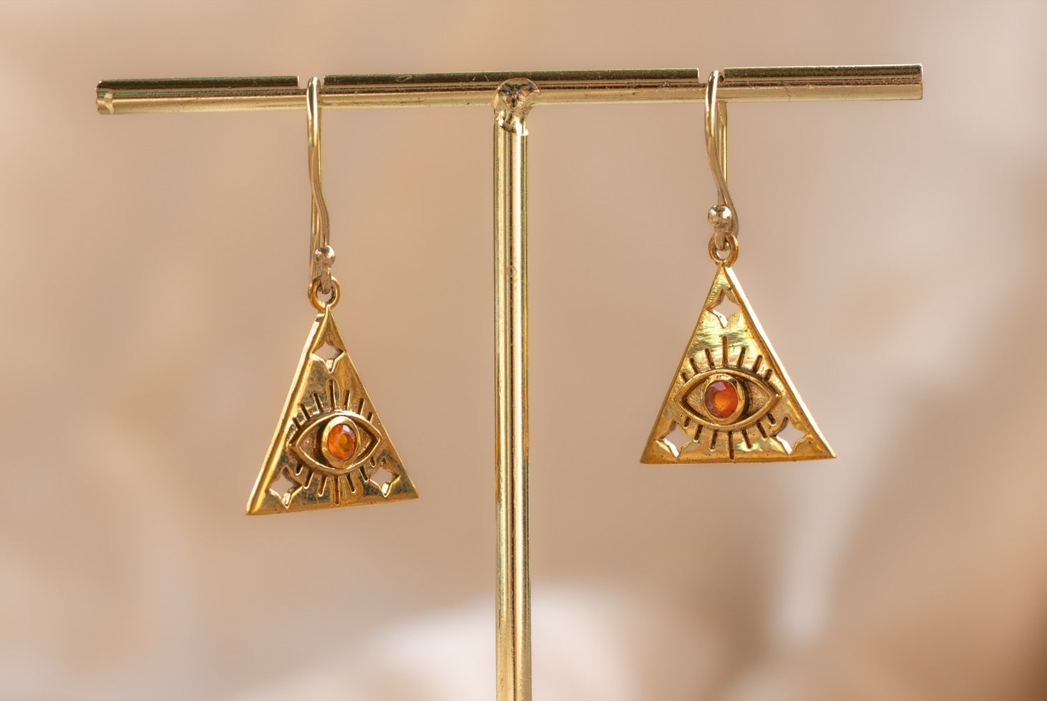 Eye of Horus Triangle handmade brass earring with carnelian stone — Land of Sundara