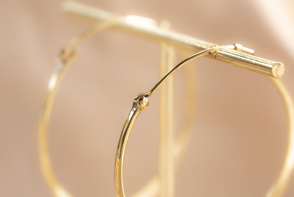 Horizon Hoop handmade brass earring in gold — Land of Sundara