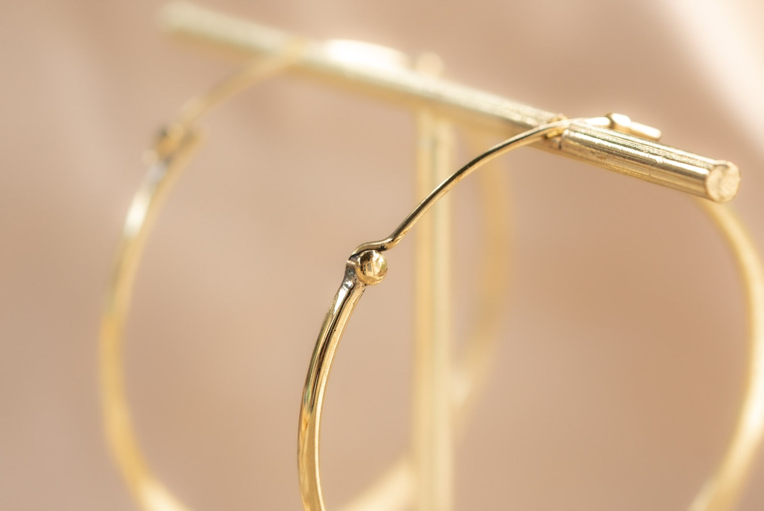 Horizon Hoop handmade brass earring in gold — Land of Sundara