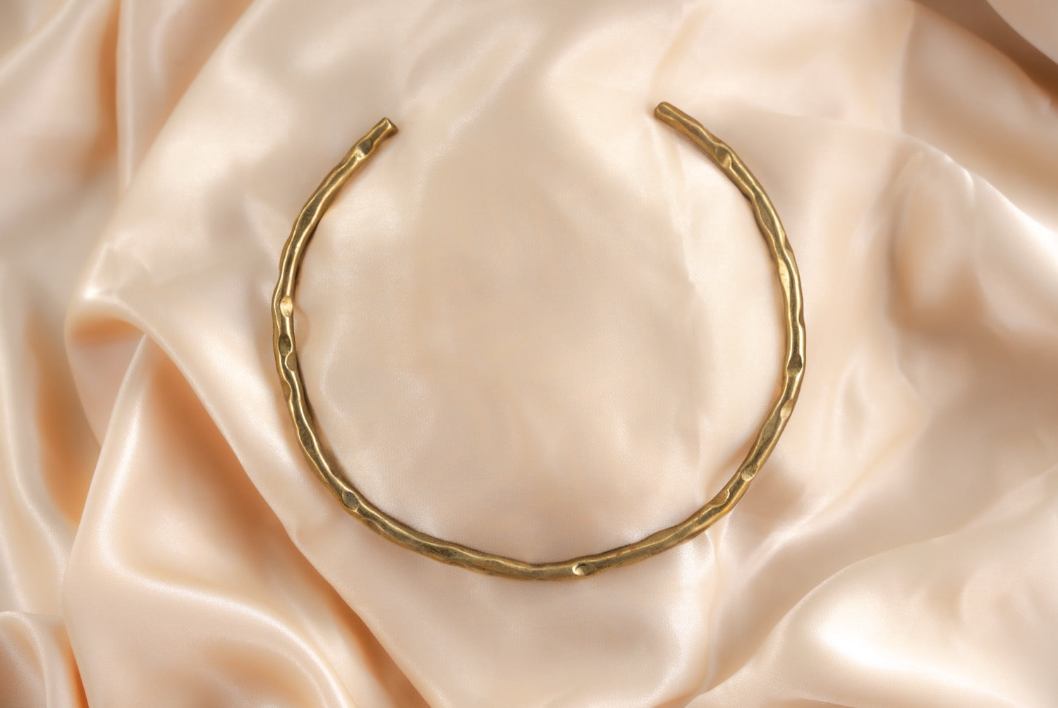 Hammered circle handmade brass necklace in gold — Land of Sundara