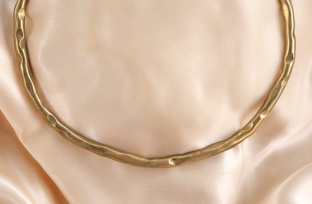 Hammered circle handmade brass necklace in gold — Land of Sundara