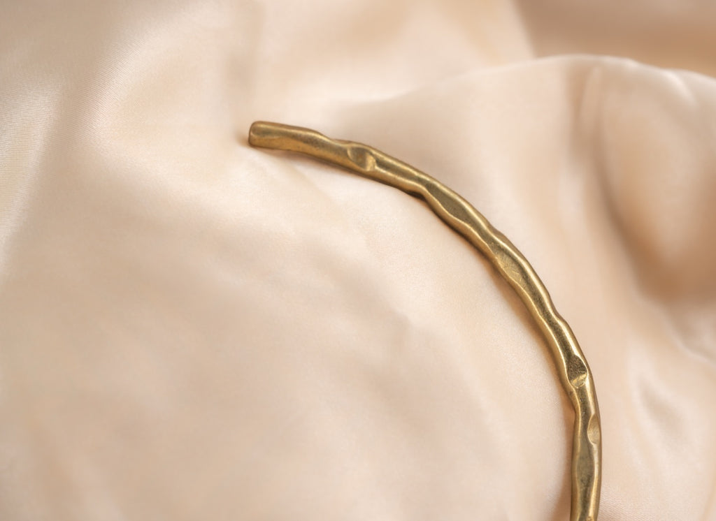 Hammered circle handmade brass necklace in gold — Land of Sundara