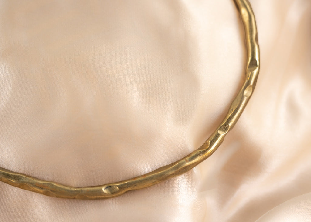 Hammered circle handmade brass necklace in gold — Land of Sundara