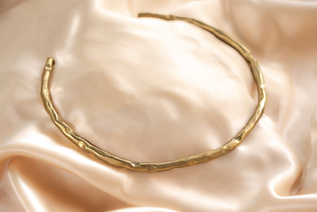 Hammered circle handmade brass necklace in gold — Land of Sundara