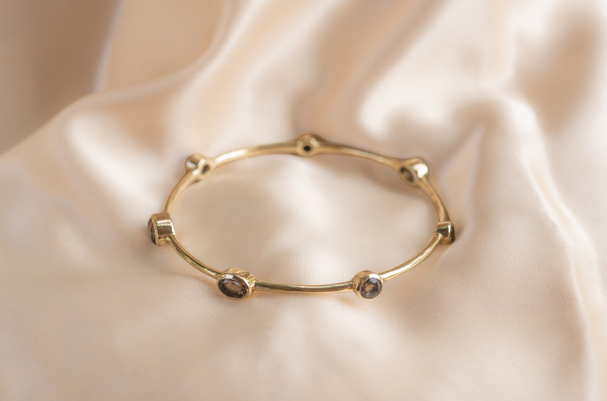 Aurelia Smoulder Bangle handmade brass bracelet with smokey quartz stone — Land of Sundara