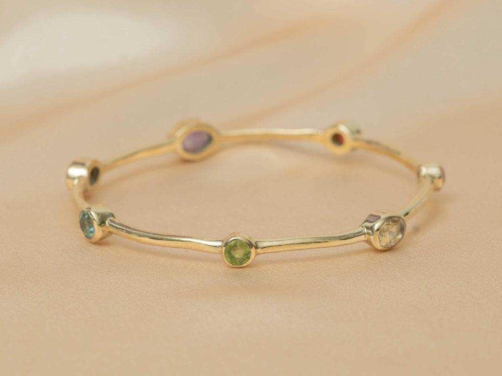 Celestial Harmony 7-Stone Brass Bangle