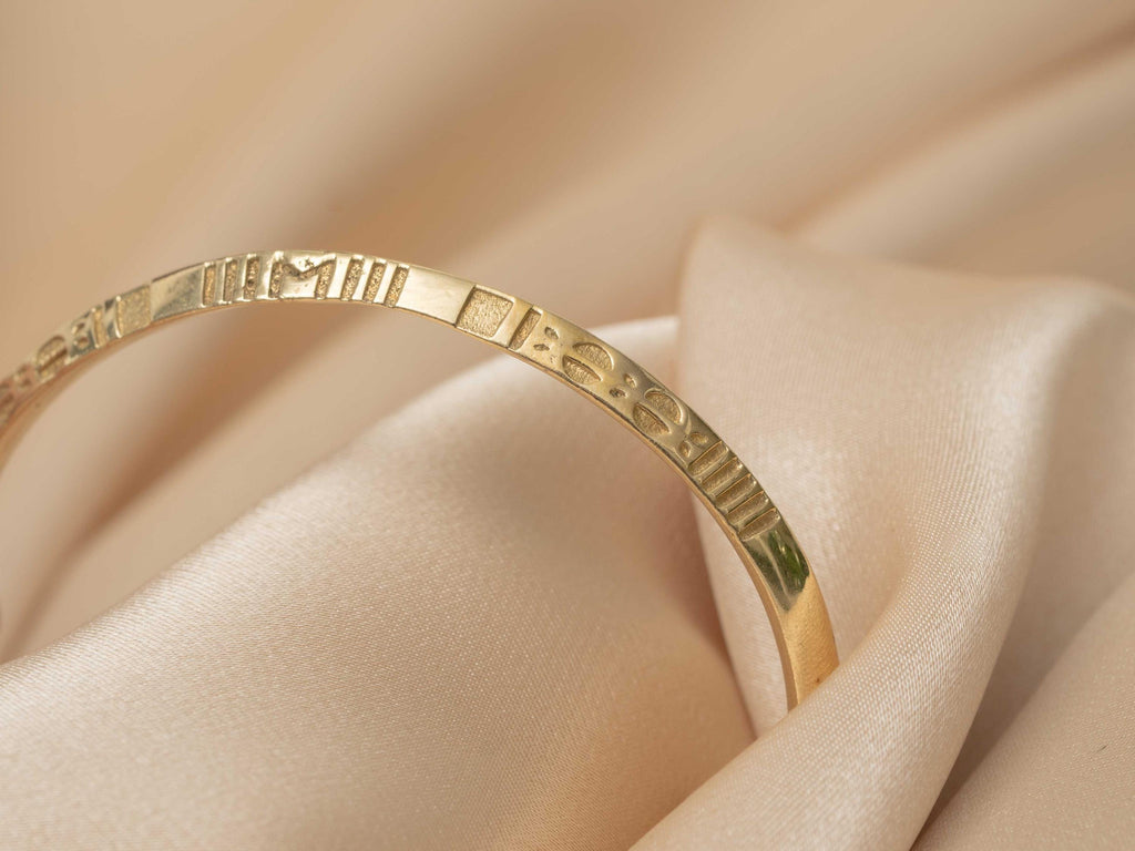 Sphinx Engraved Gold Bangle  - need description