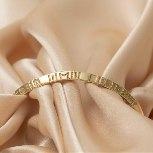 Sphinx Engraved Gold Bangle  - need description
