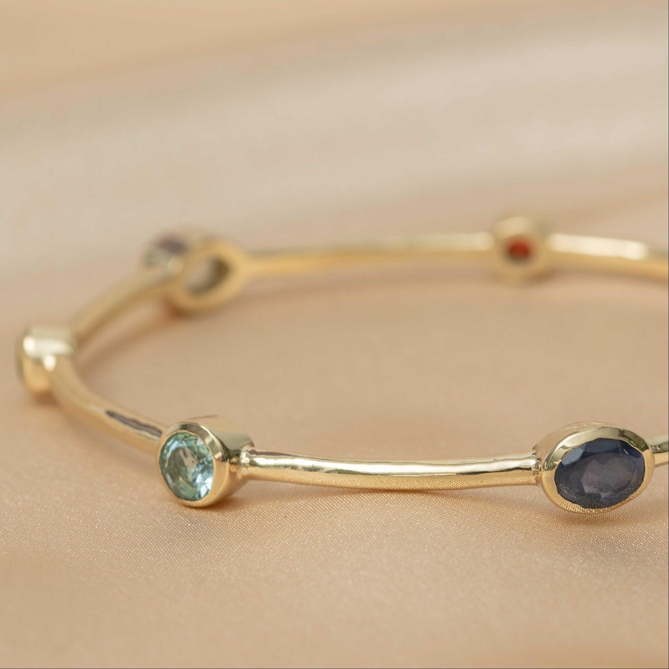 Celestial Harmony 7-Stone Brass Bangle