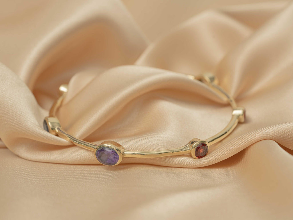 Celestial Harmony 7-Stone Brass Bangle