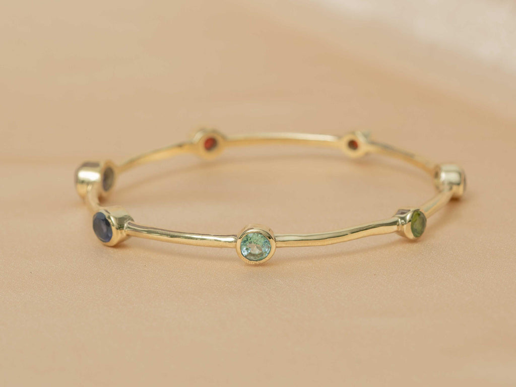 Celestial Harmony 7-Stone Brass Bangle