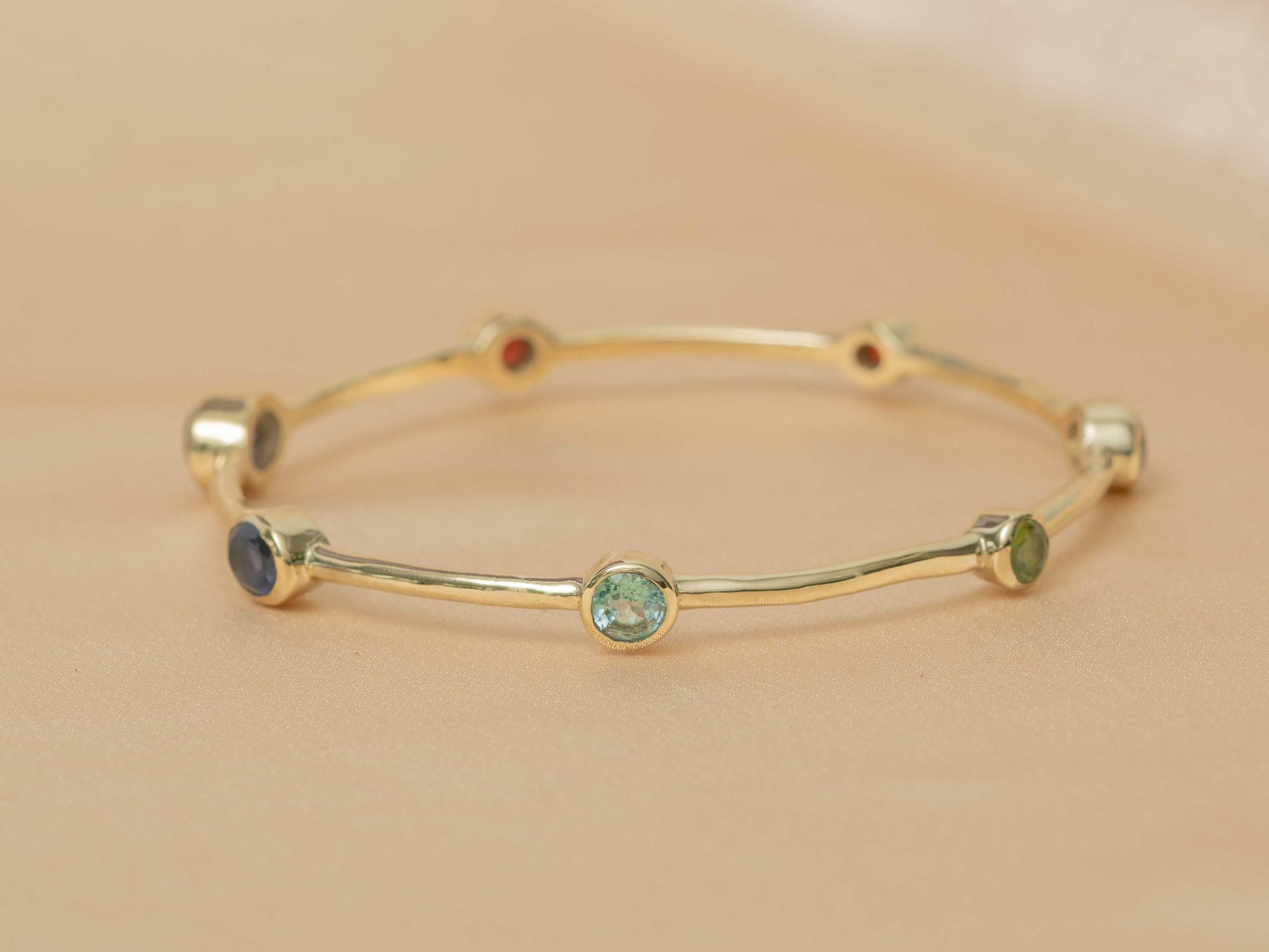 Celestial Harmony 7-Stone Brass Bangle