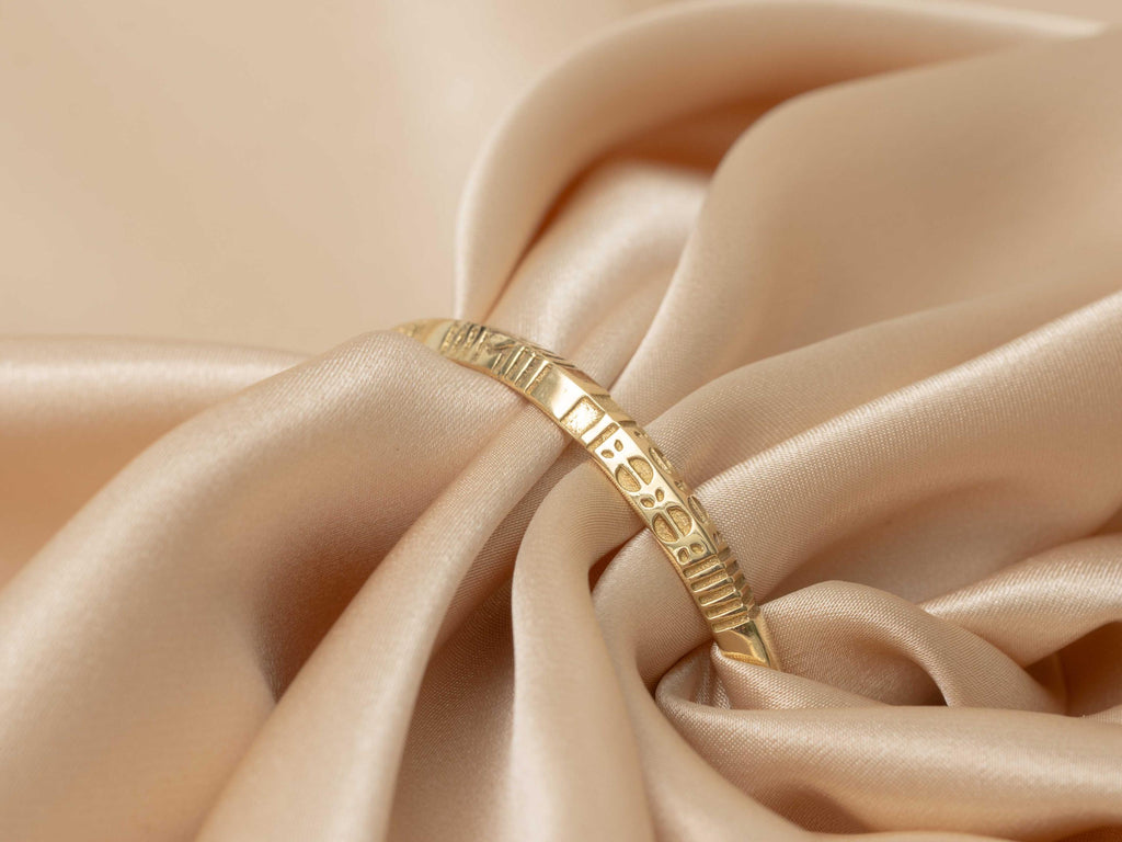 Sphinx Engraved Gold Bangle  - need description